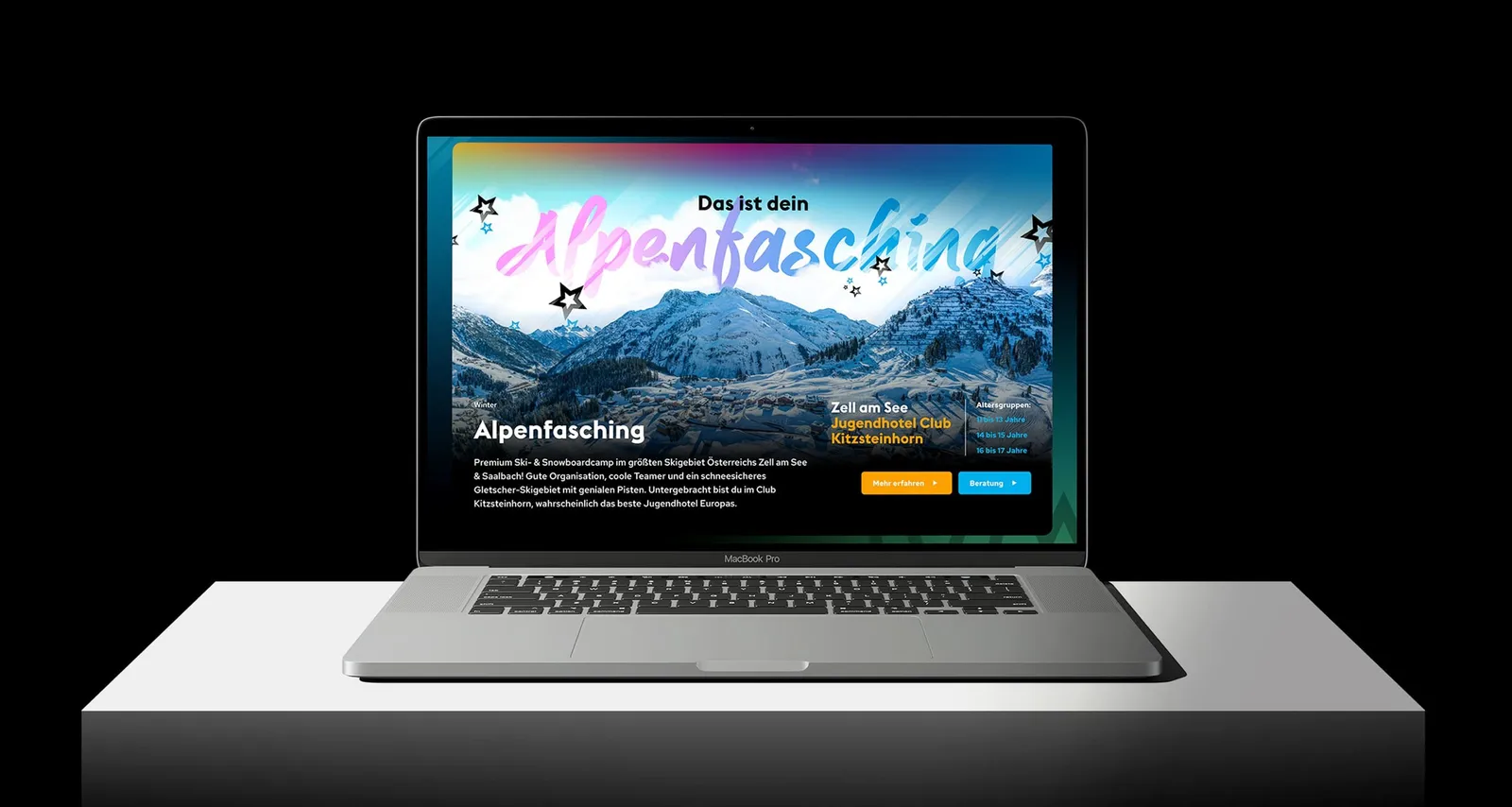 Laptop showing the “Alpenfasching” page on a dark background