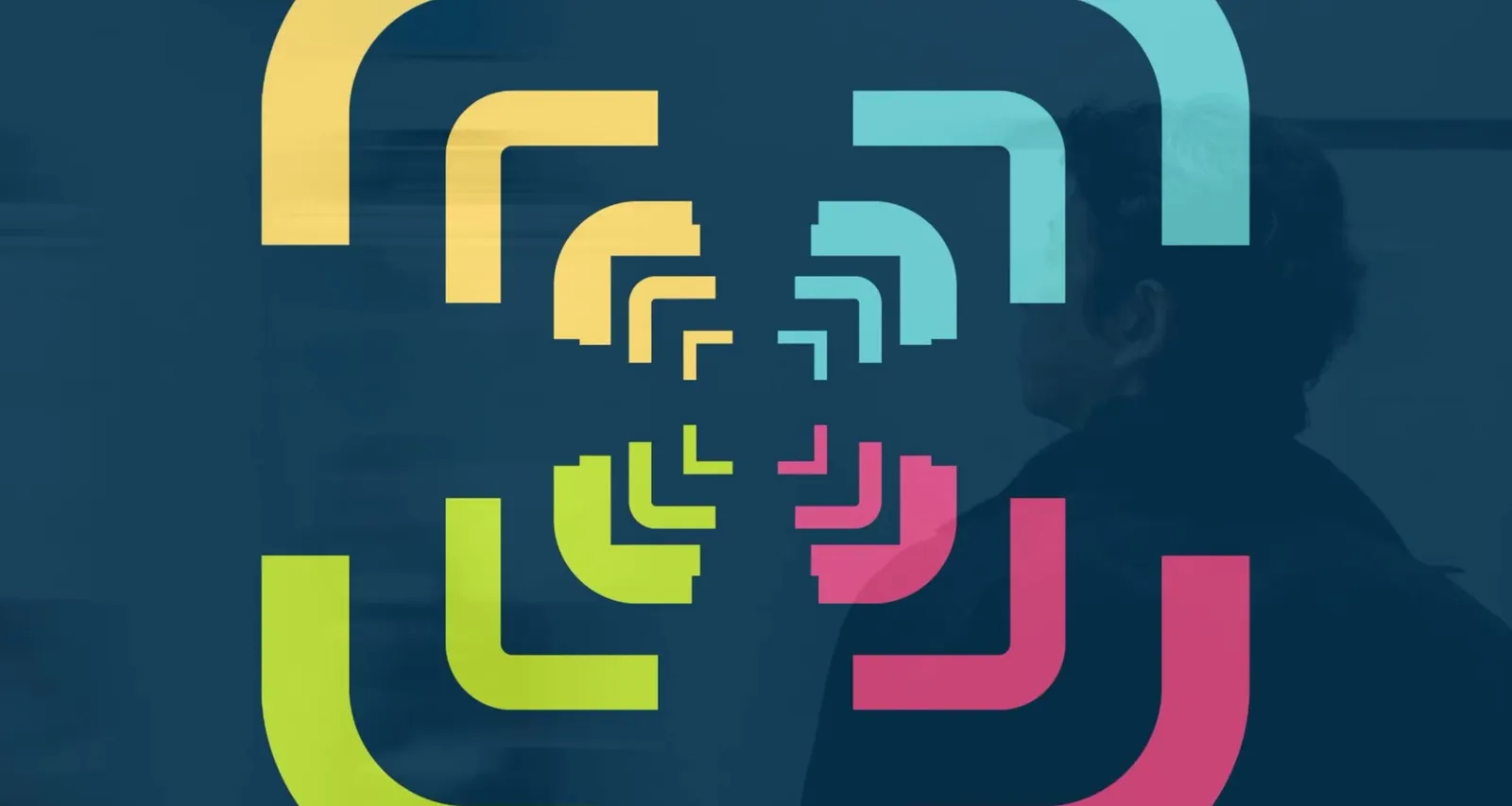 Animation in which the four colored brackets of the symbol assemble into the logo
