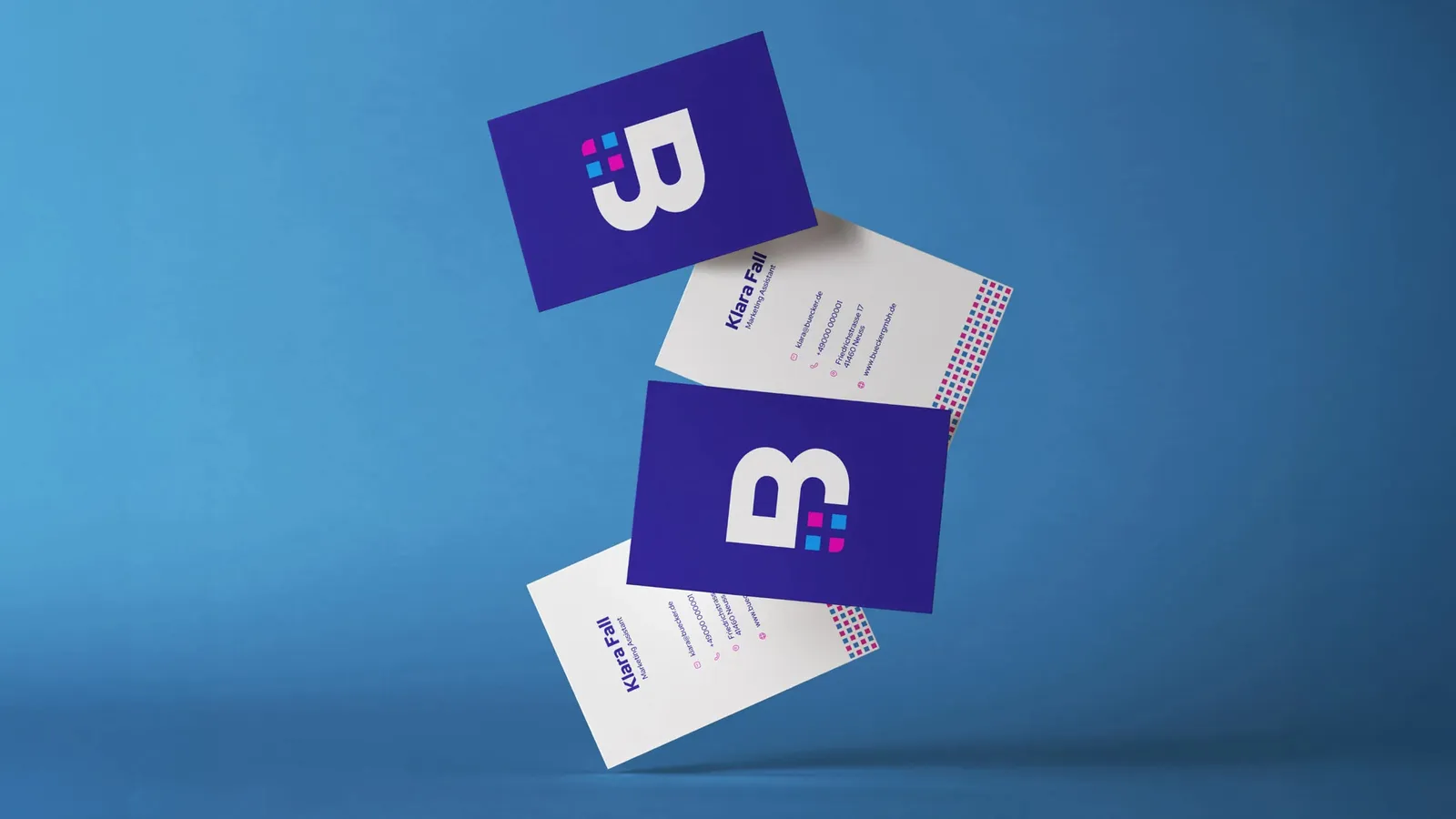 Business cards and letterhead with the Bücker logo, floating above a blue background