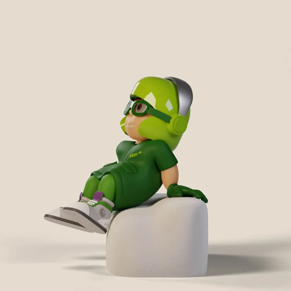 Mio sits on a white cube and looks up