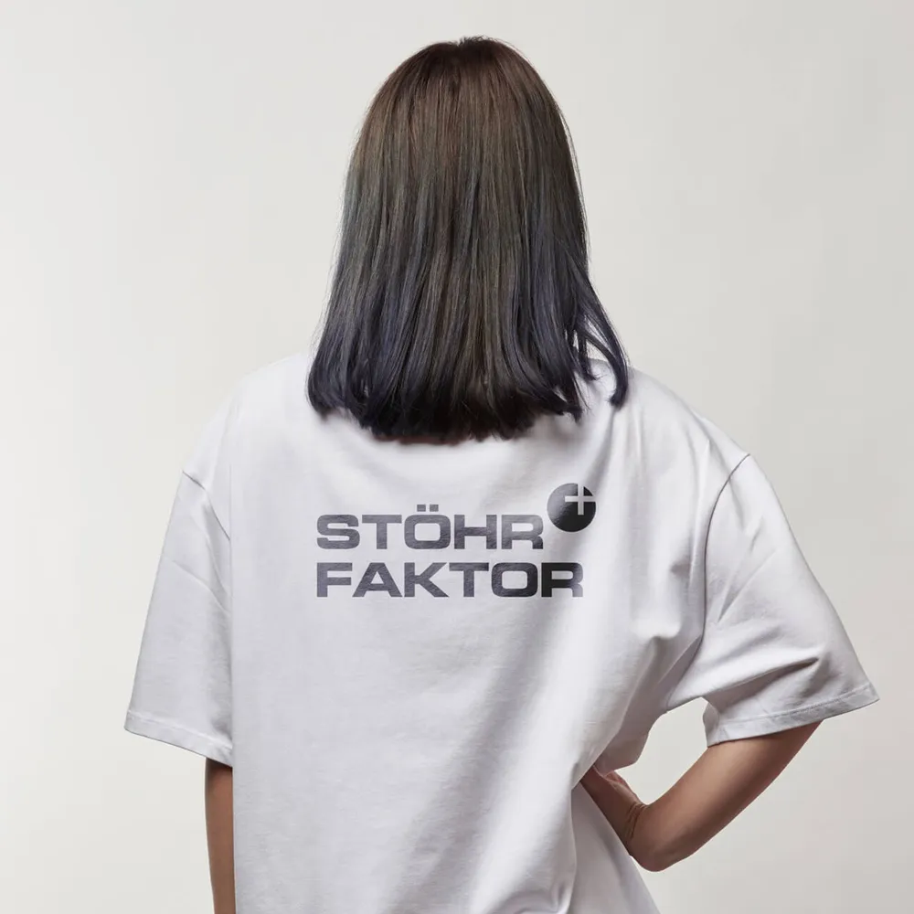 White T-shirt from behind with the wordmark on the back