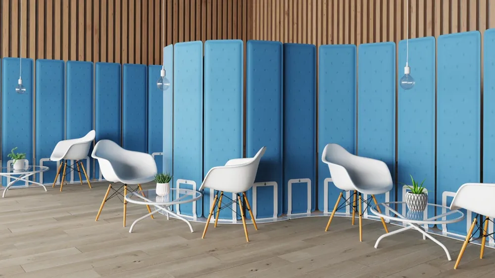 A bright canteen area with colored ceiling sails