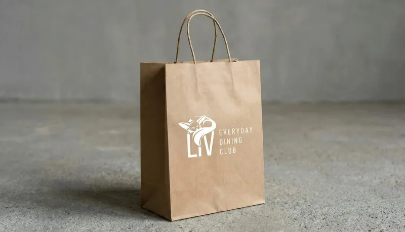Kraft paper carrier bag with the white Liv logo