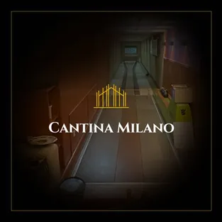 The narrow aisle of the restaurant, darkened, with the logo on top