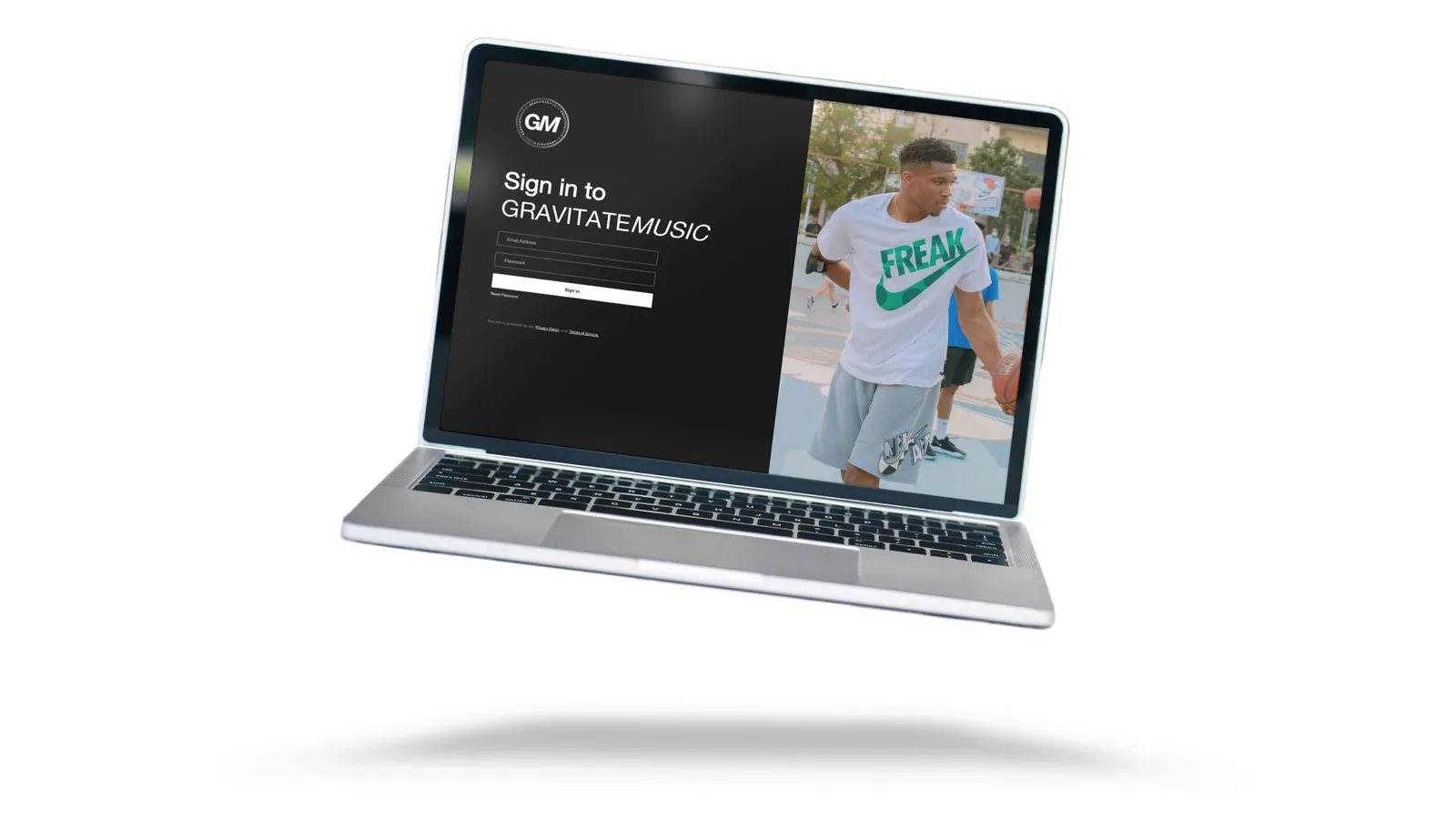 A laptop showing the sign-in page “Sign in to GRAVITATEMUSIC”
