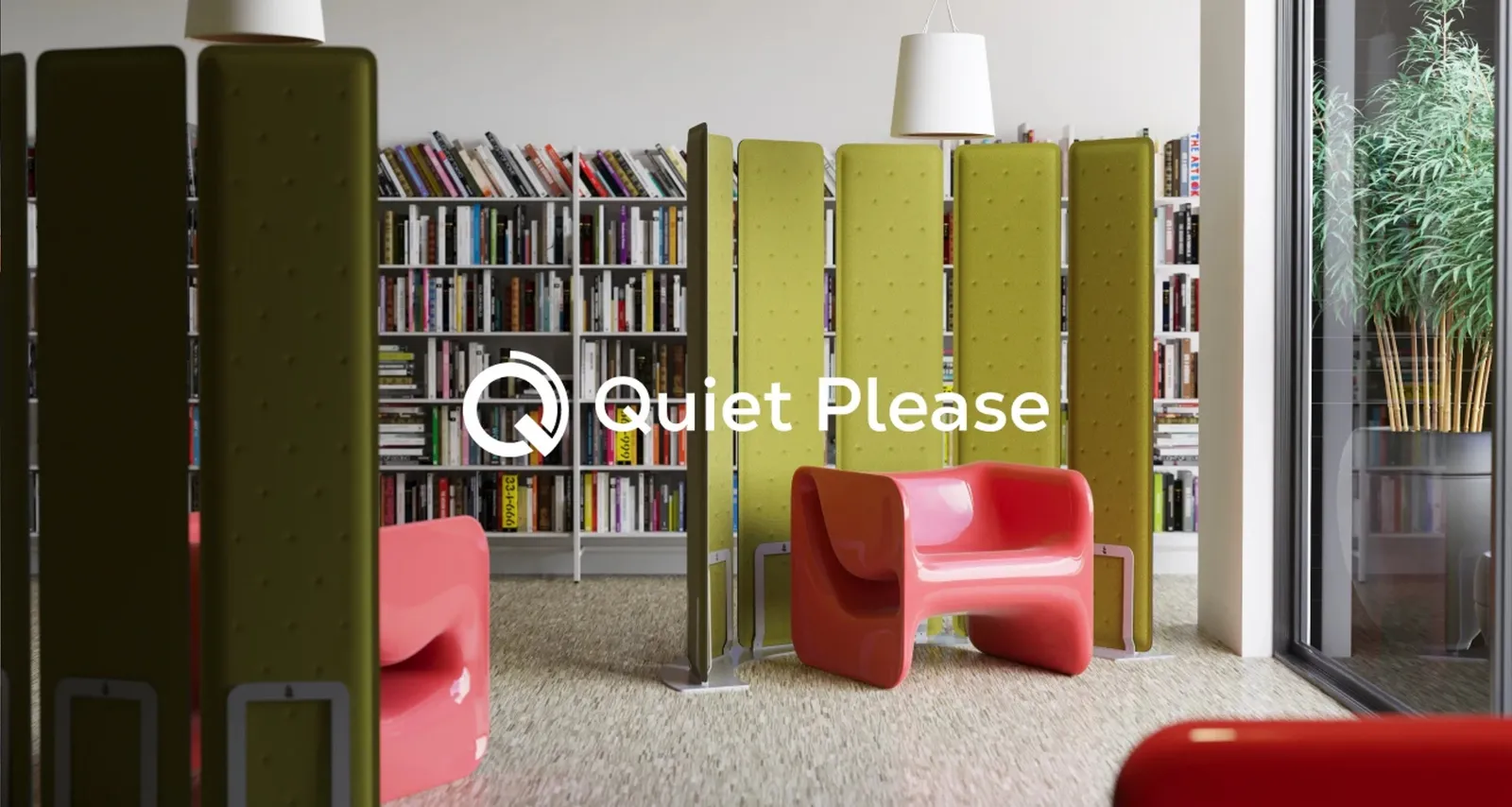 A library room with olive-green partition walls, above it the logo “Quiet Please”