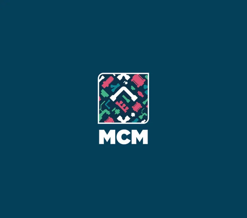 The mark above the “MCM” wordmark, on dark blue