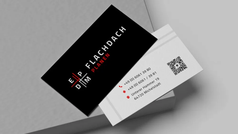 Two business cards in black and white with logo, contact details and QR code