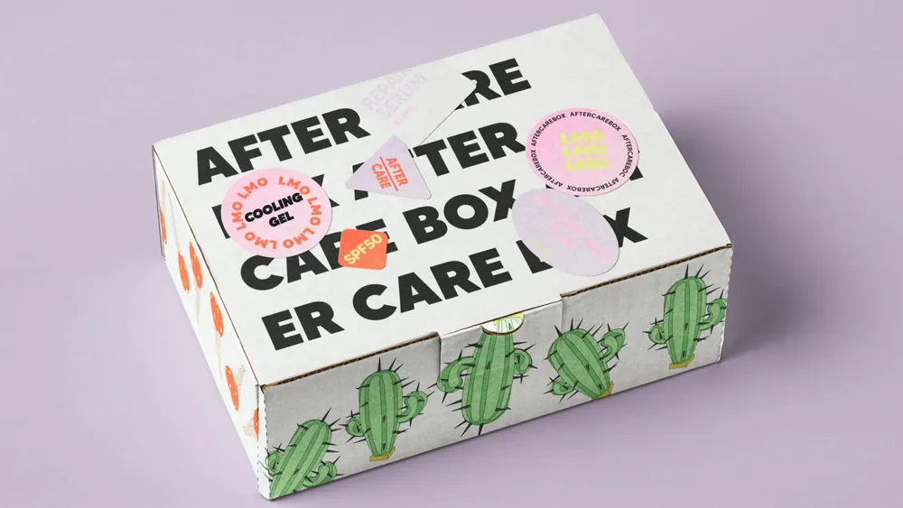 White aftercare box with a cactus pattern and stickers applied