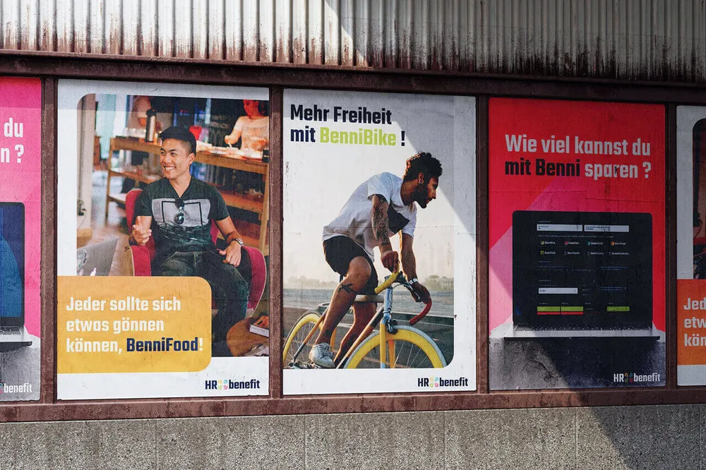 Three posters side by side on a wall, among them “More freedom with BenniBike!”