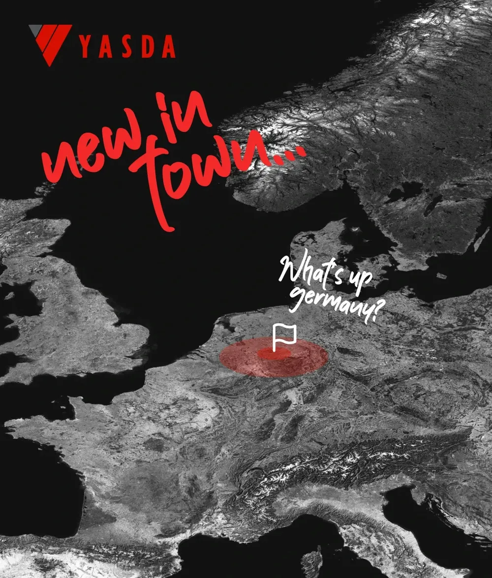 Satellite map of Europe with a red dot on Germany and the words “new in town…”