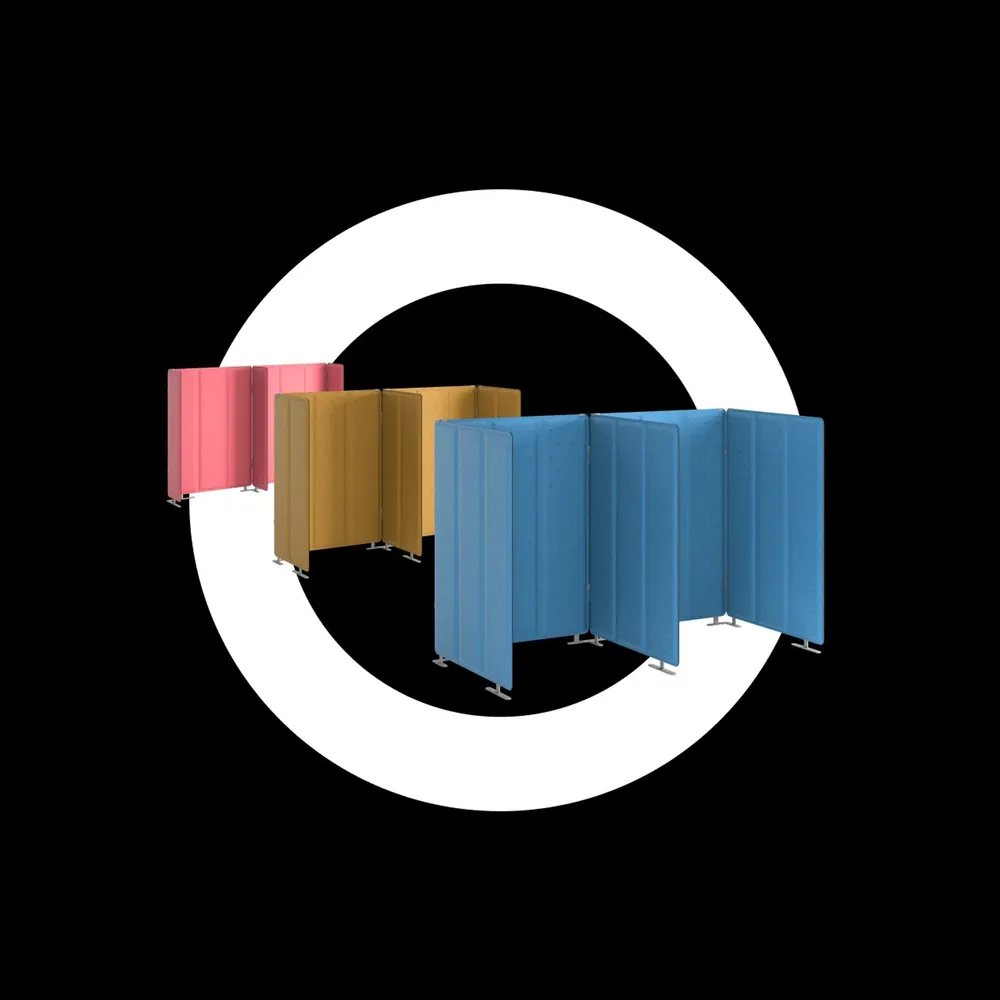 Several colored partition walls stand staggered in the same hollow circle
