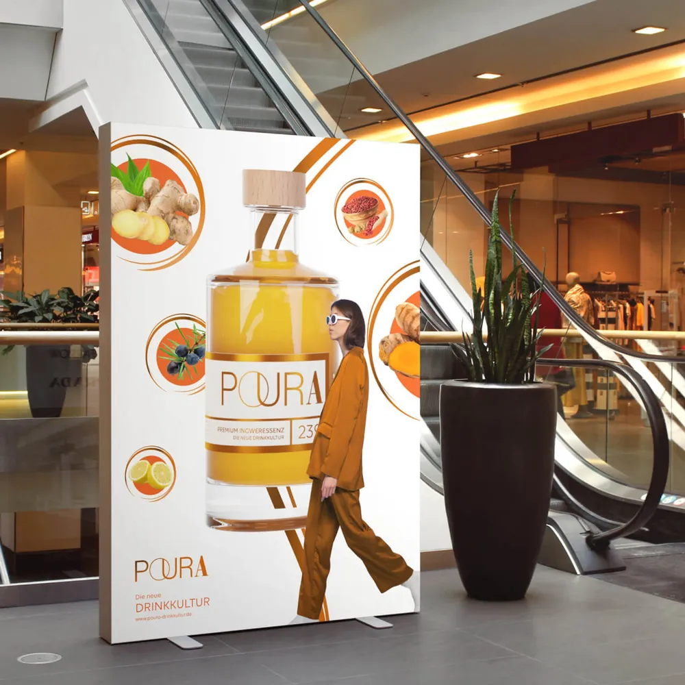 A display stand with the bottle and its ingredients in a shopping arcade