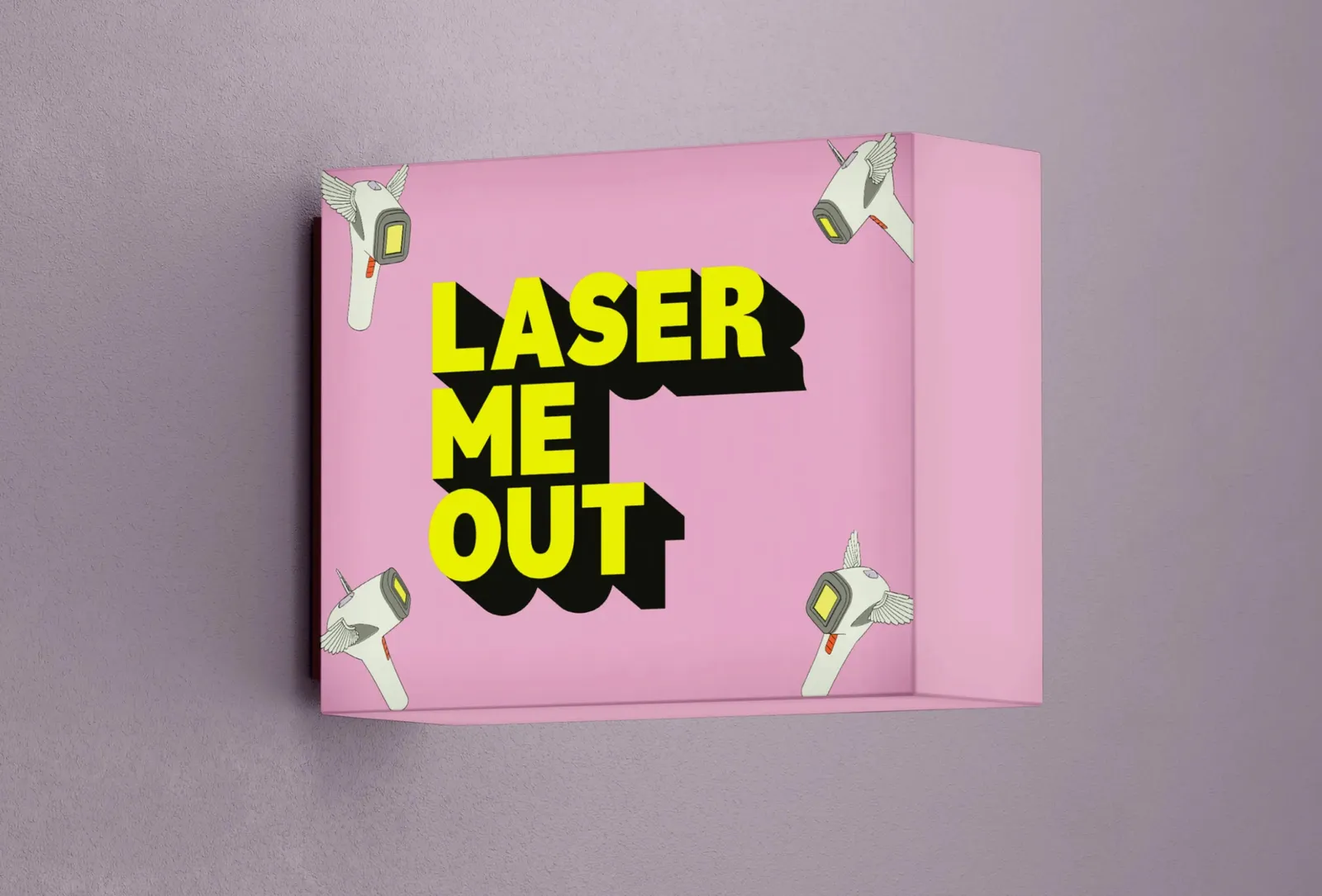 Pink light box with the “Laser Me Out” lettering in yellow with a black drop shadow
