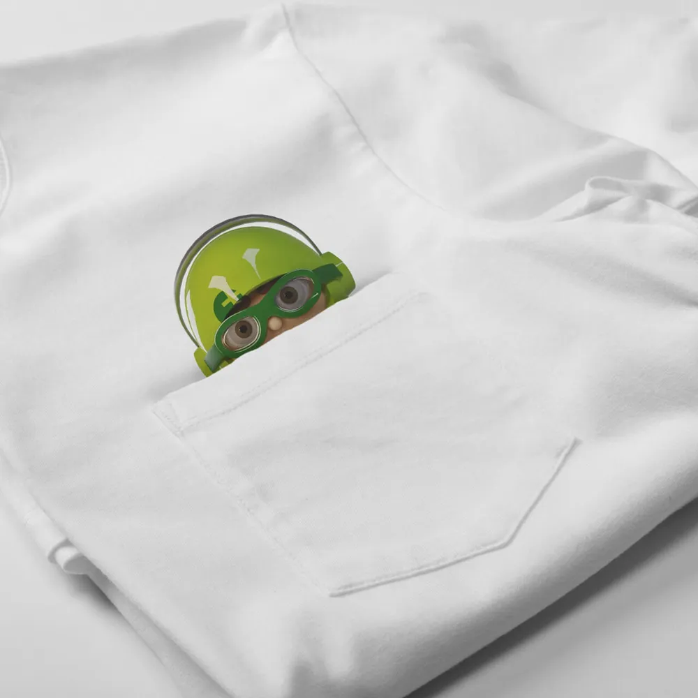 Mio peeks out of the breast pocket of a white T-shirt