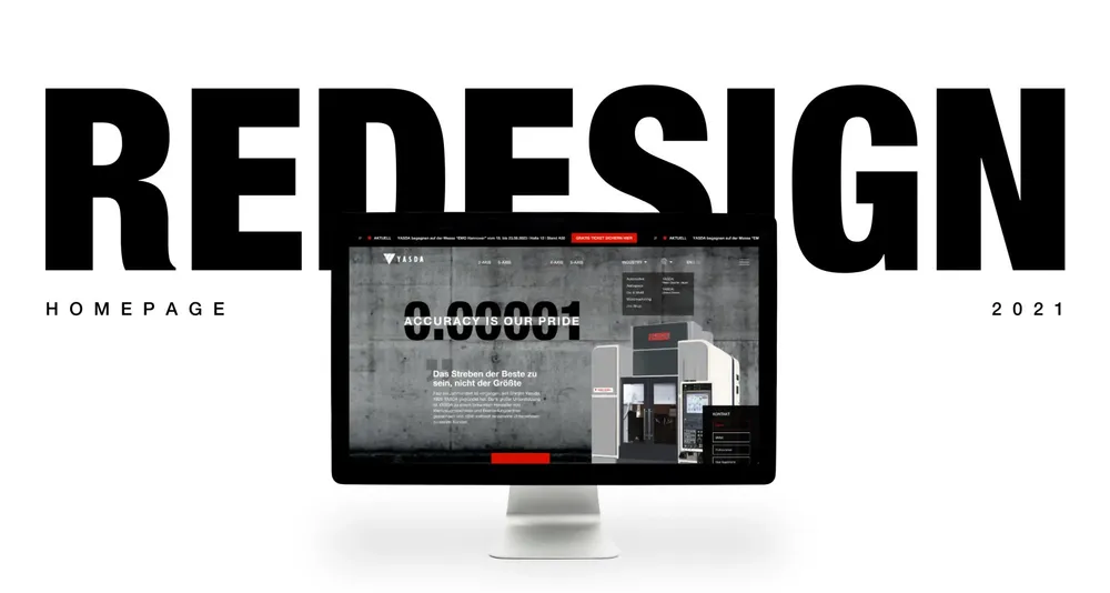 Monitor showing the new home page in front of the word “Redesign”
