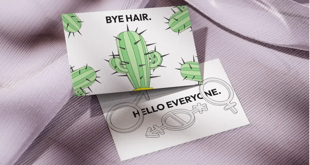 Two cards on lilac fabric: “Bye hair.” with cacti and “Hello everyone.” with gender symbols