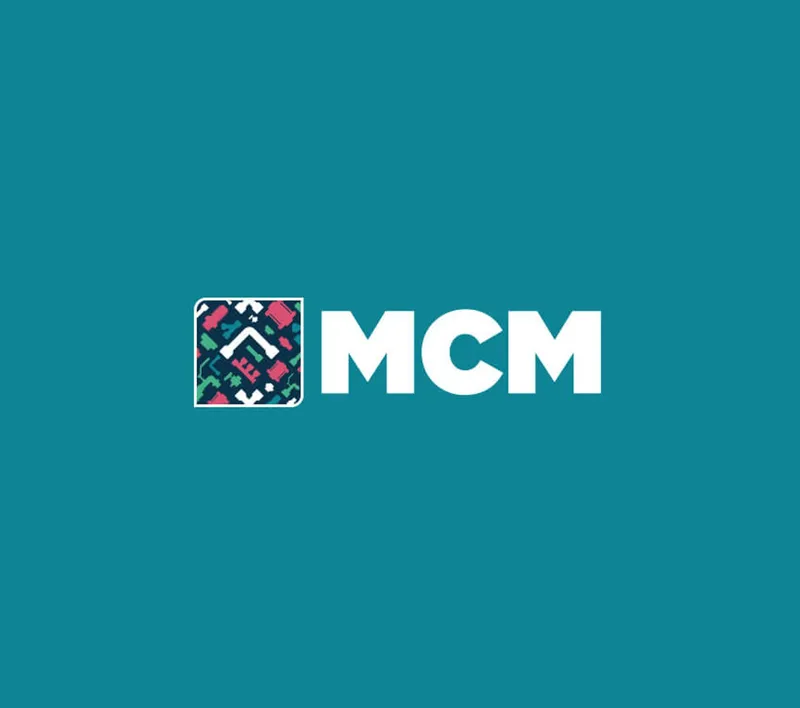 Horizontal version: the mark next to “MCM”, on teal